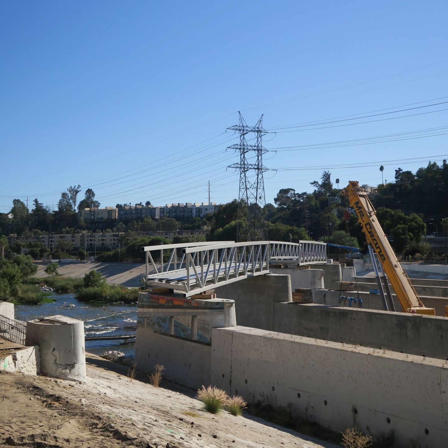 Red Car Pedestrian Bridge Under Construction